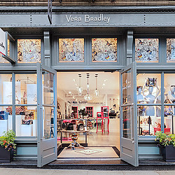 A store front with a glass door.