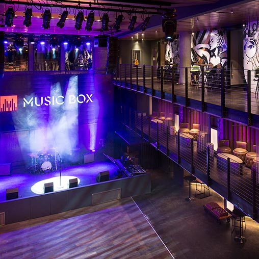 A stage with a large screen.