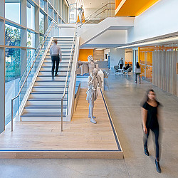 A person walking down a flight of stairs.