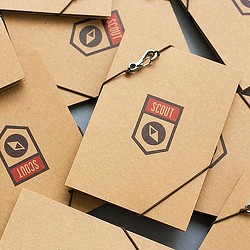 A folded shirt with a logo.