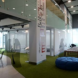 A large white sign in a building.