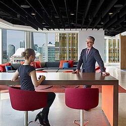 A man and a woman sitting at a table.