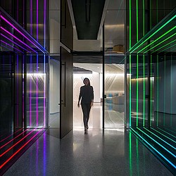 A person walking down a hallway.