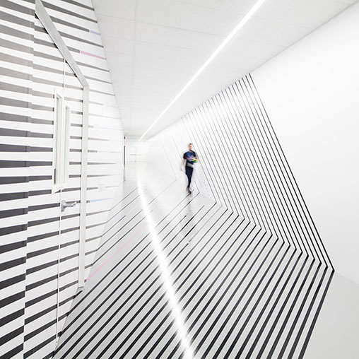 A person walking on a bridge.