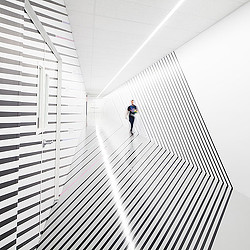 A person walking on a bridge.