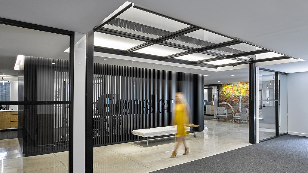 A person walking in a room.