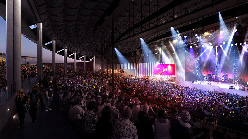 A large crowd of people at a concert.