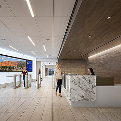 A person standing in a large room.