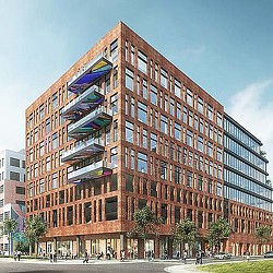 A multi-story building with balconies.