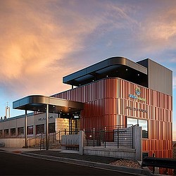A building with a glass front.