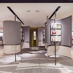 A room with a glass door and a glass wall with a glass window.