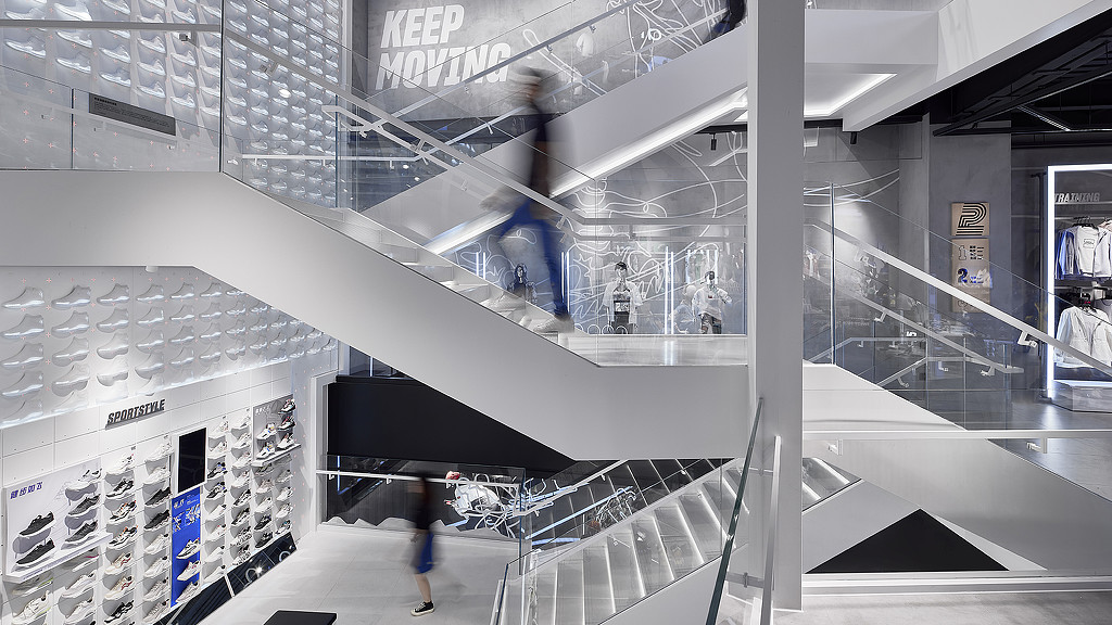 Industrial Chic Interior Design of the Adidas Flagship Store in