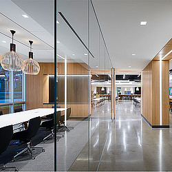 A room with tables and chairs.