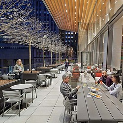 People sitting at tables in a restaurant.