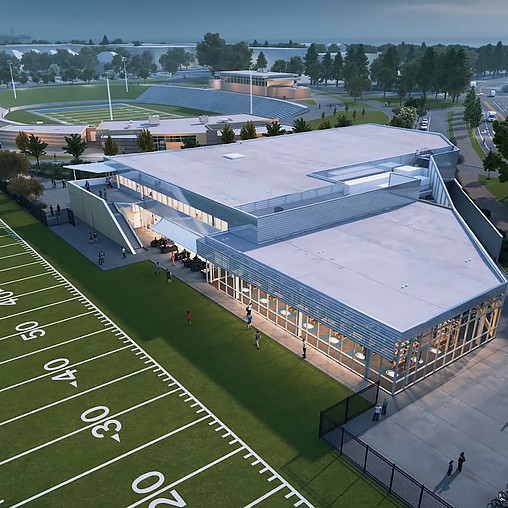 A sports stadium with a field.