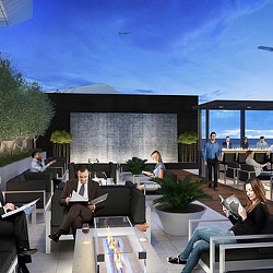 A group of people sitting outside.