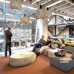 A group of people sitting on a couch in a building.