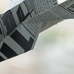 A close-up of a newspaper.