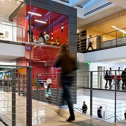 A person walking down a flight of stairs.