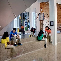 A group of people sitting in a room.