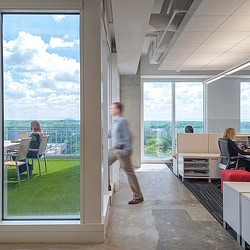 A person walking in a room.