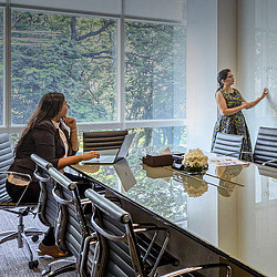 A woman talking on a phone.