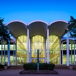 A building with a large glass front.