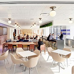 A room with tables and chairs.