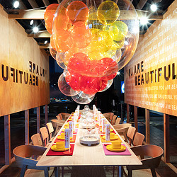 A table with balloons from it.