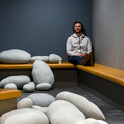 A person sitting on a bench.