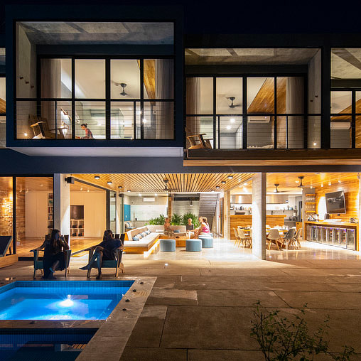 A building with windows and a pool.