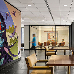 A person walking in a room.