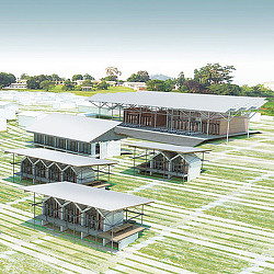 A building with a green lawn.