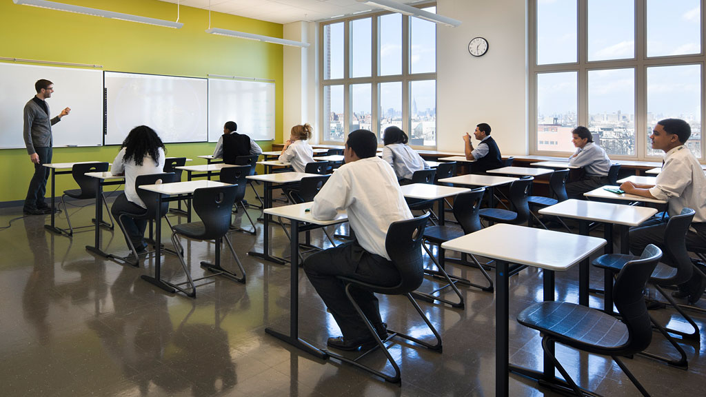 A group of people in a classroom.