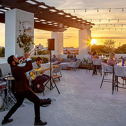 A group of people playing instruments.