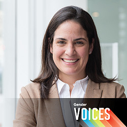 A woman smiling for the camera.