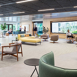 A room with chairs and tables.