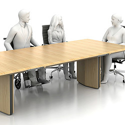 A group of mannequins sitting at a table.