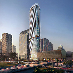 A tall building with a road in front of it.