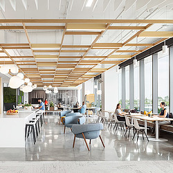 A group of people sitting at tables.