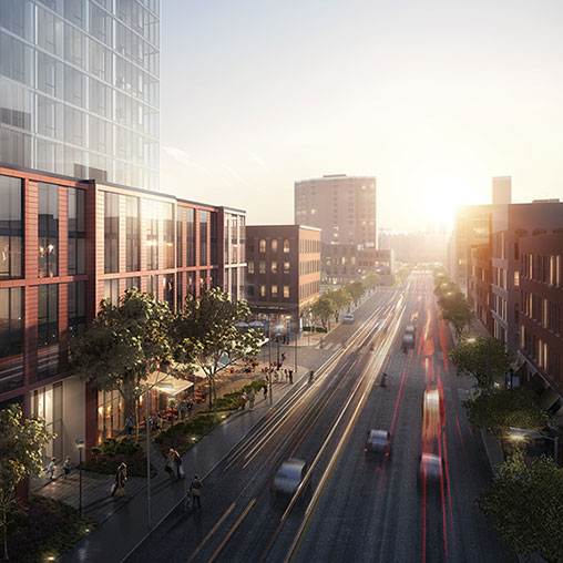 A street with cars and buildings.