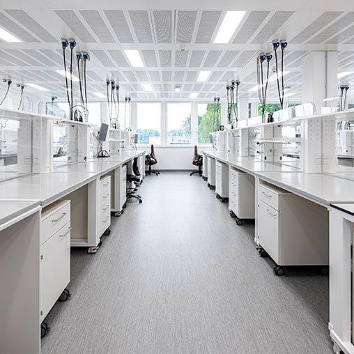 A large kitchen with white cabinets.