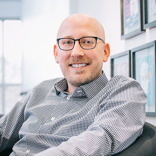 A man wearing glasses.