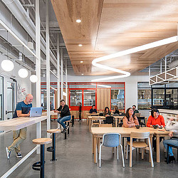 A group of people sitting at tables.