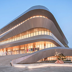 Yulin Grand Theater lit up in the evening