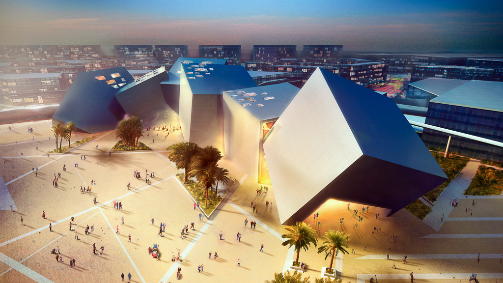 A large building with a courtyard and trees in the front.