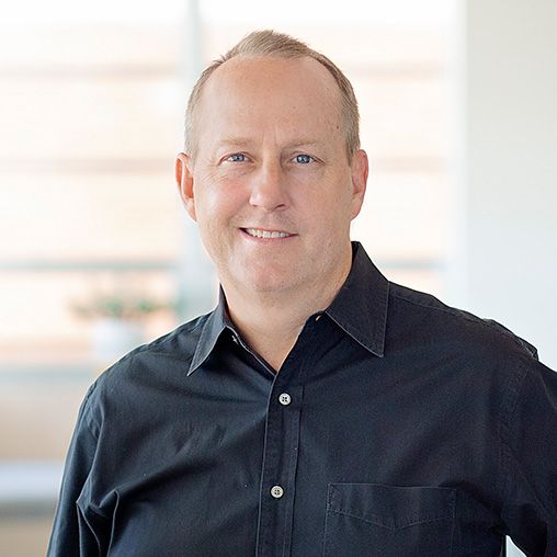A man in a black shirt.