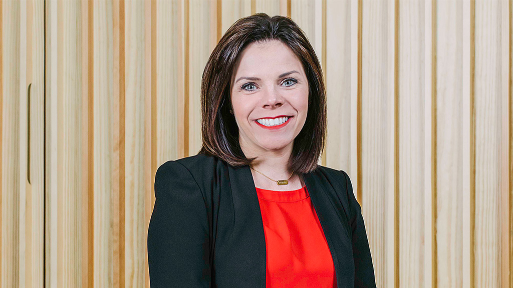 A person smiling for the camera.