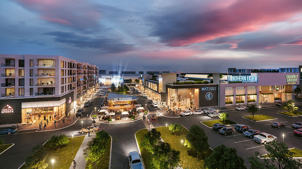 A parking lot with cars and buildings.
