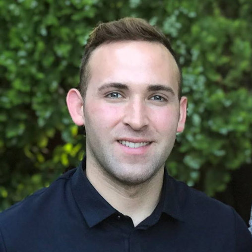 A man smiling for the camera.